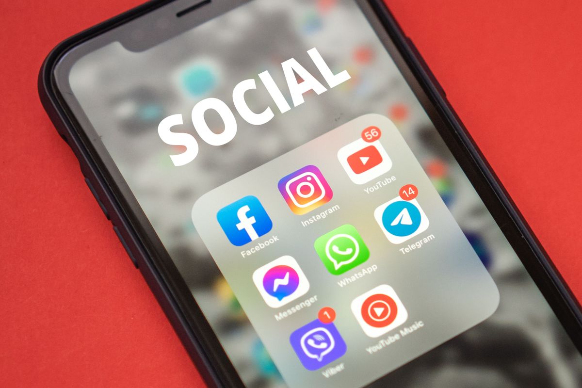 A close-up of a smartphone screen showing a grid of app icons